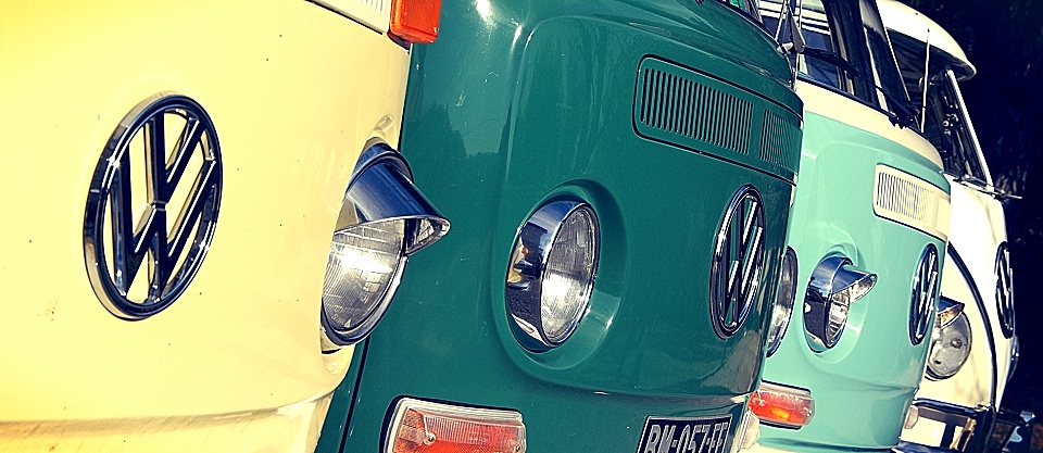 Front view of three vw campervans.